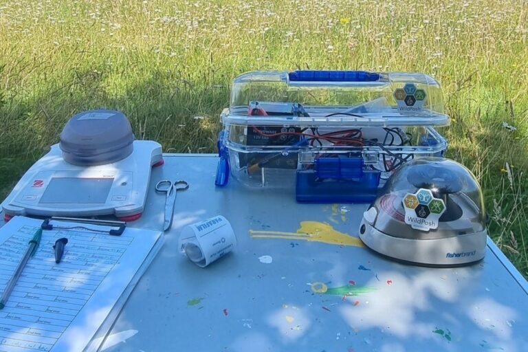 Testing nectar sampling methods in the field, with a battery powered field centrifuge on the table