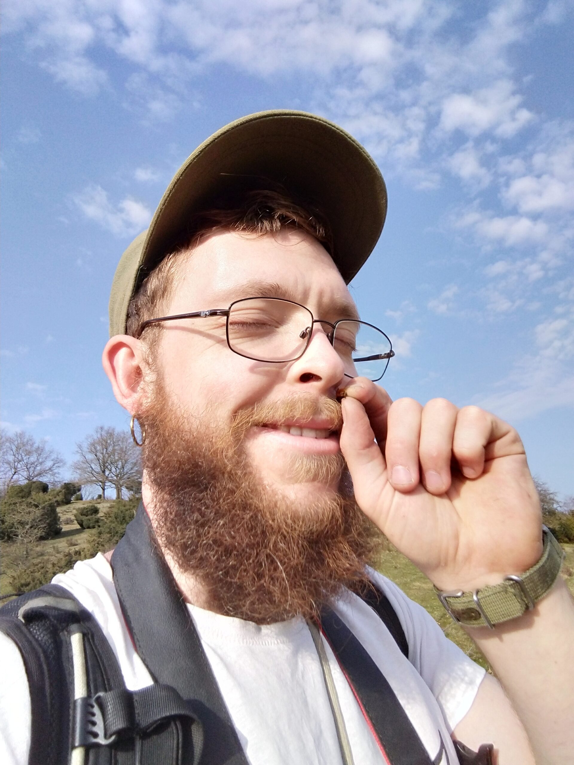 Sean Birk Bek Craig smelling a bee